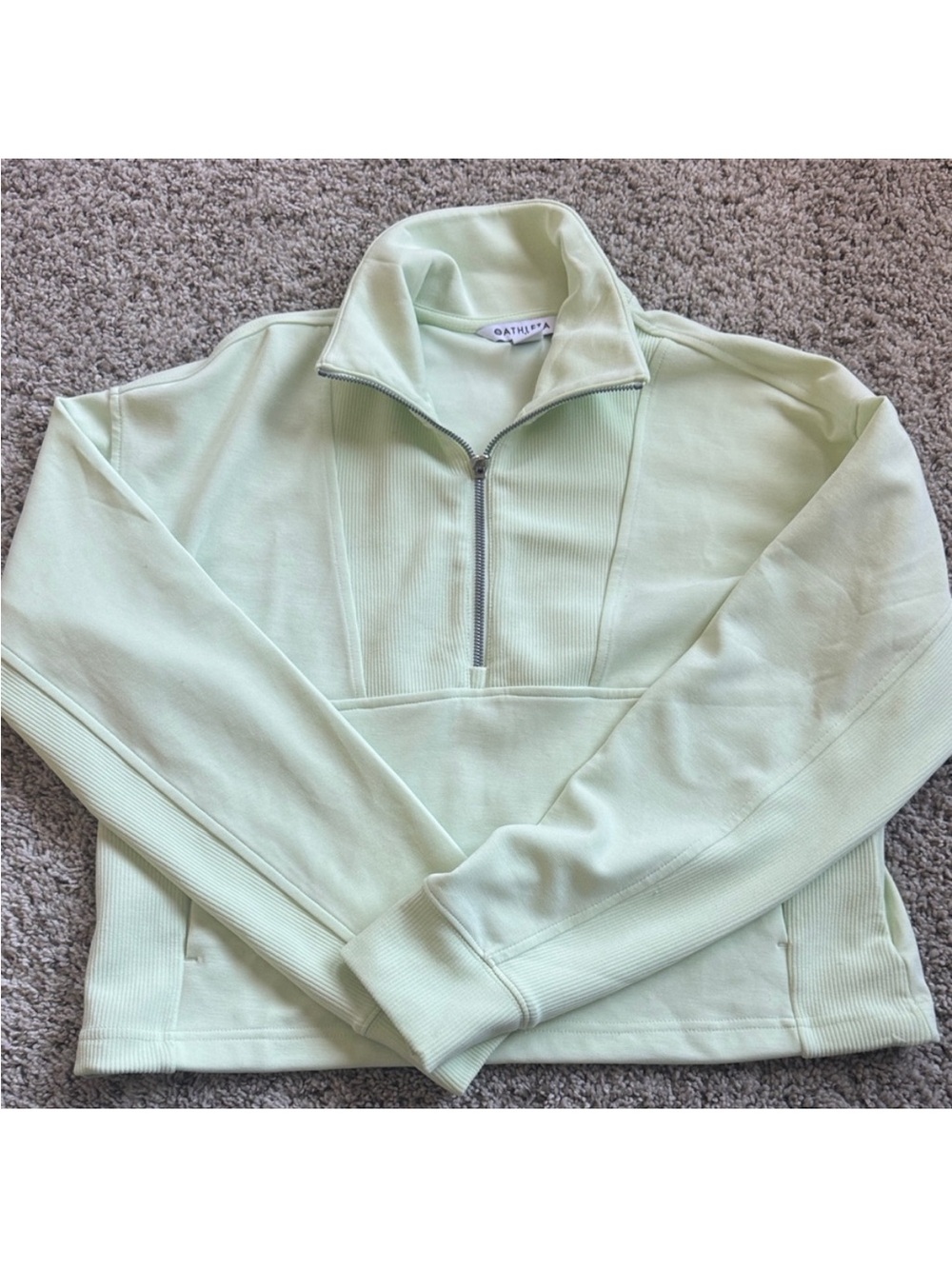 Athleta Seasoft 1/4 Zip. EUC, only worn once. Size medium. Color Glow